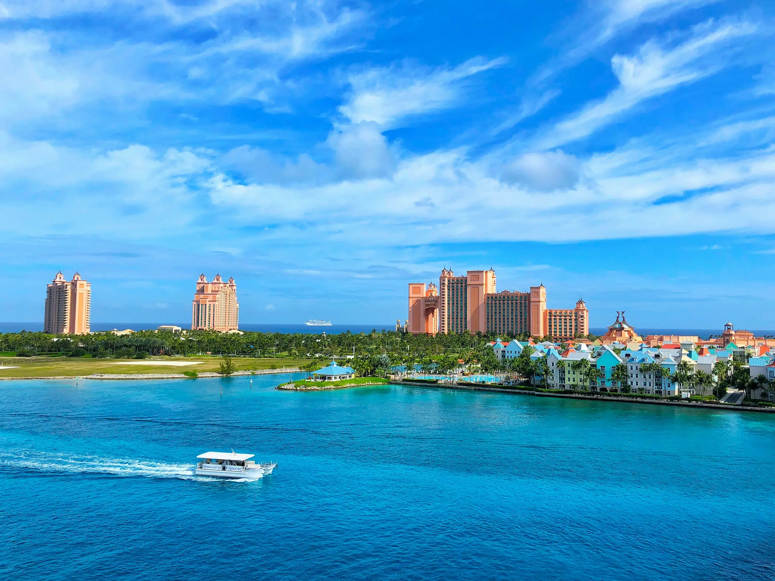 The pastel towers and harbour of Paradise Island under a bright sky, Nassau, Bahamas