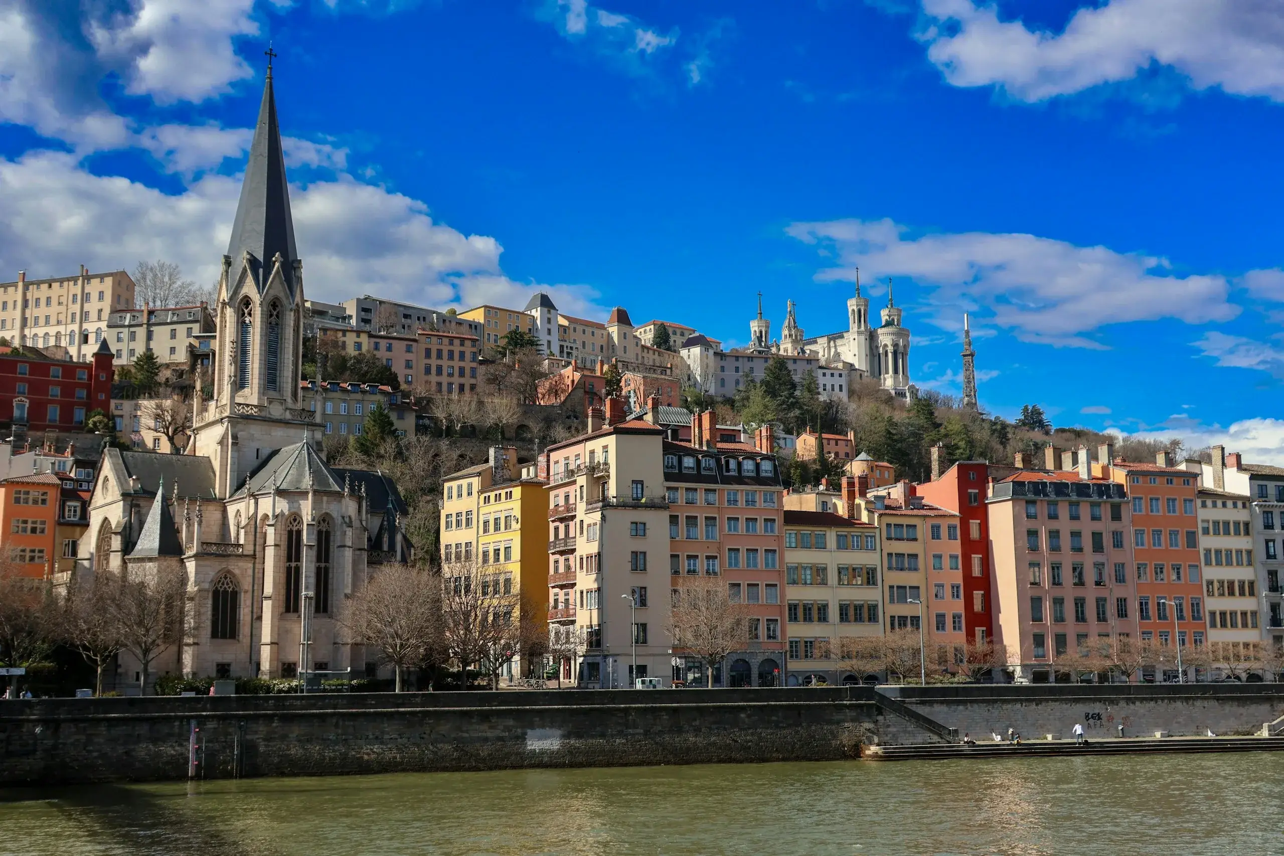 Saint-Georges church and colourful old Lyon houses along the Saône