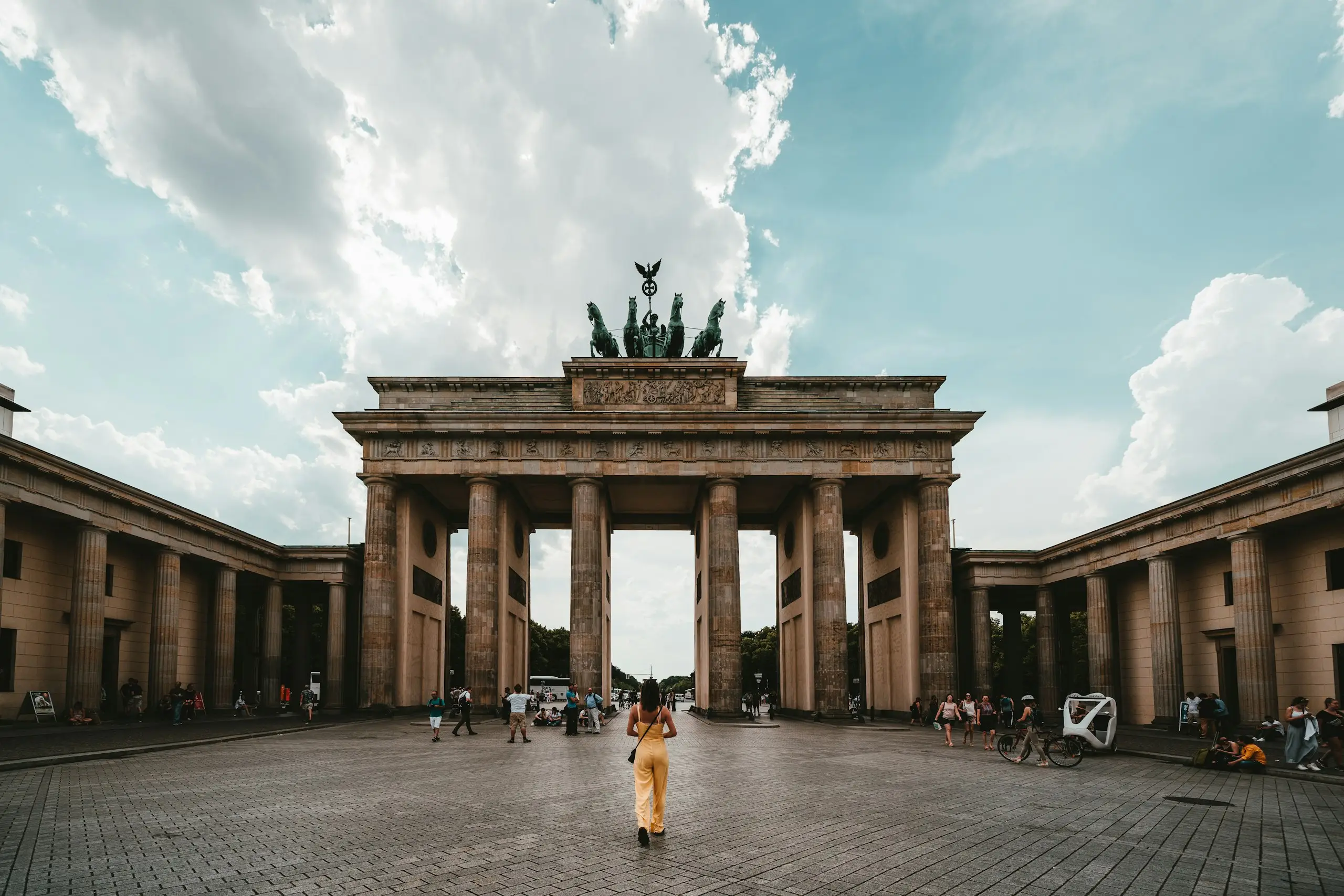 The Brandenburg Gate with a visitor in the square, Berlin