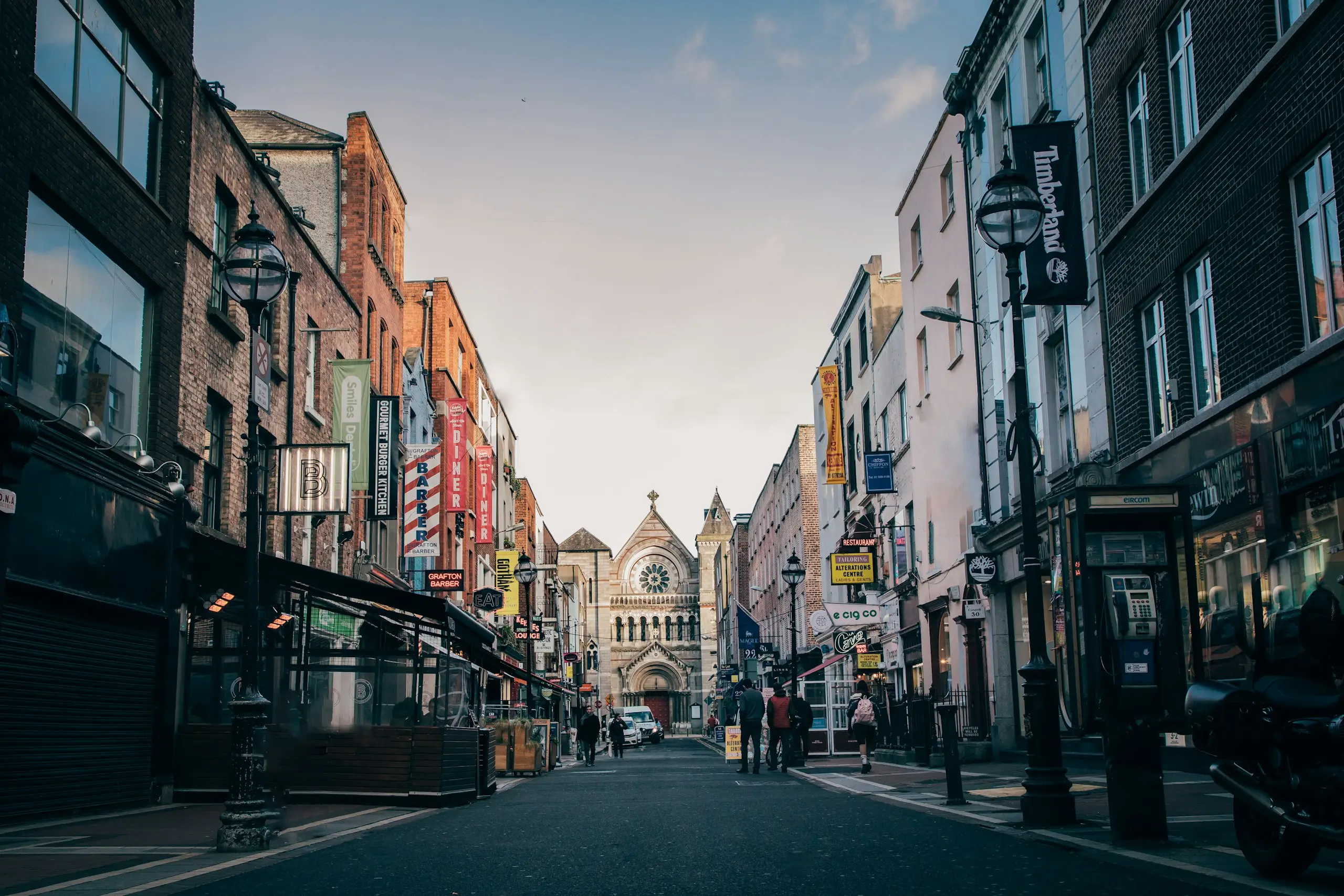 A cobbled street leading to a church spire, Dublin