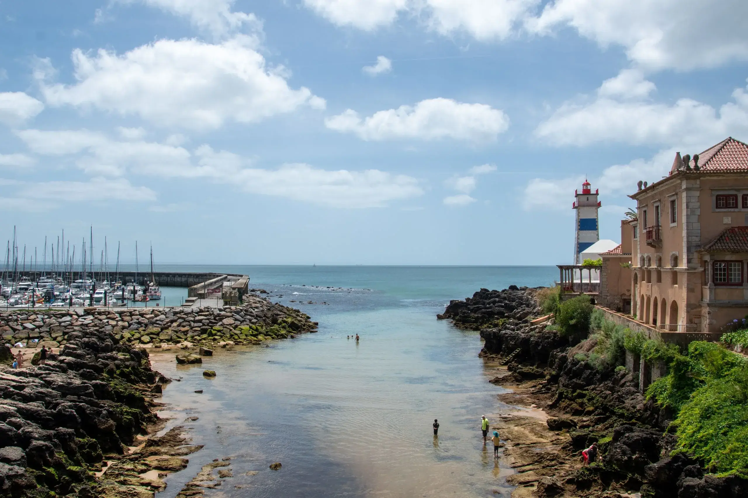 Rocky inlet and the Santa Marta lighthouse in Cascais
