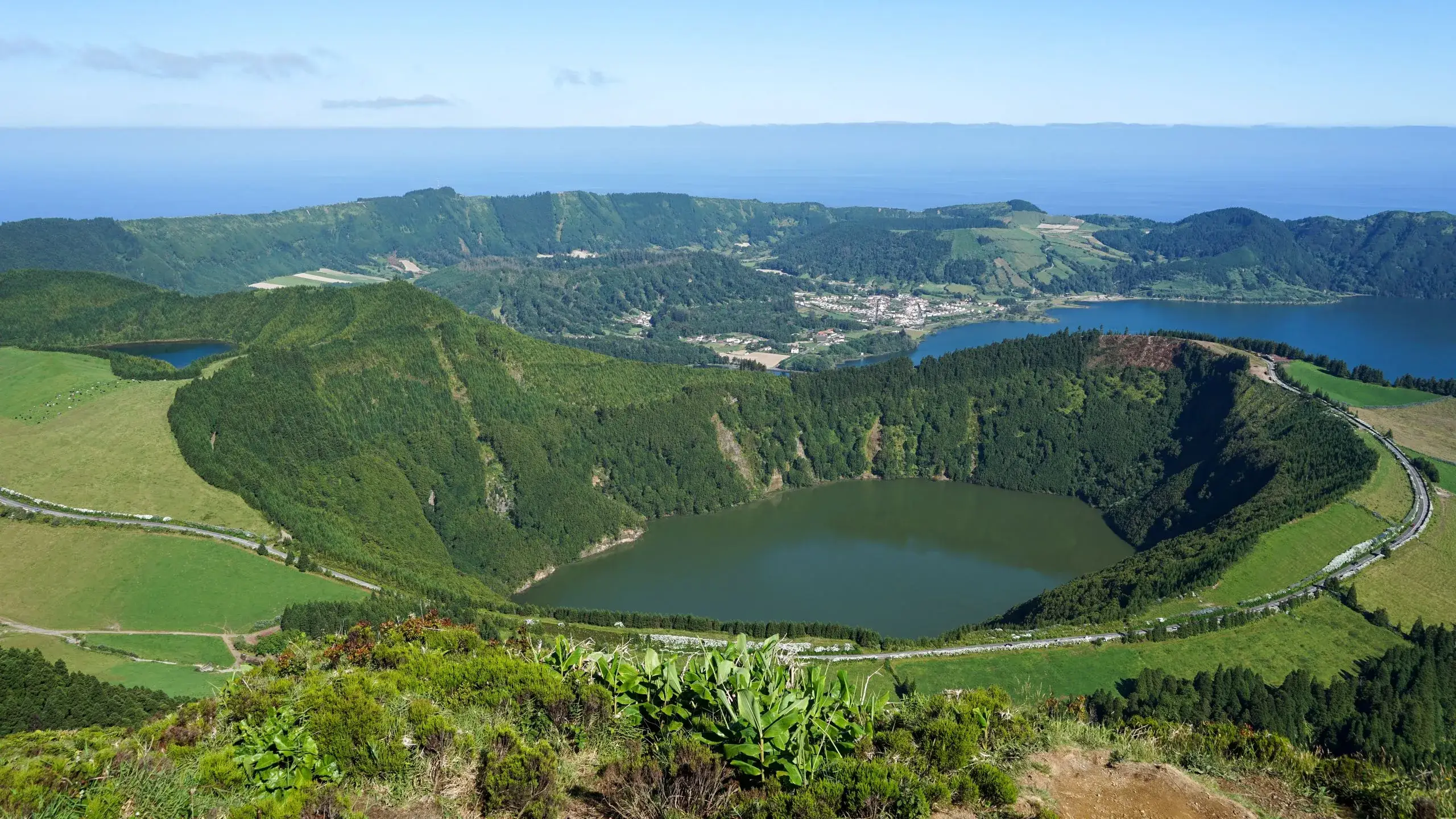 Green crater lake inside a volcanic caldera on São Miguel, near Ponta Delgada