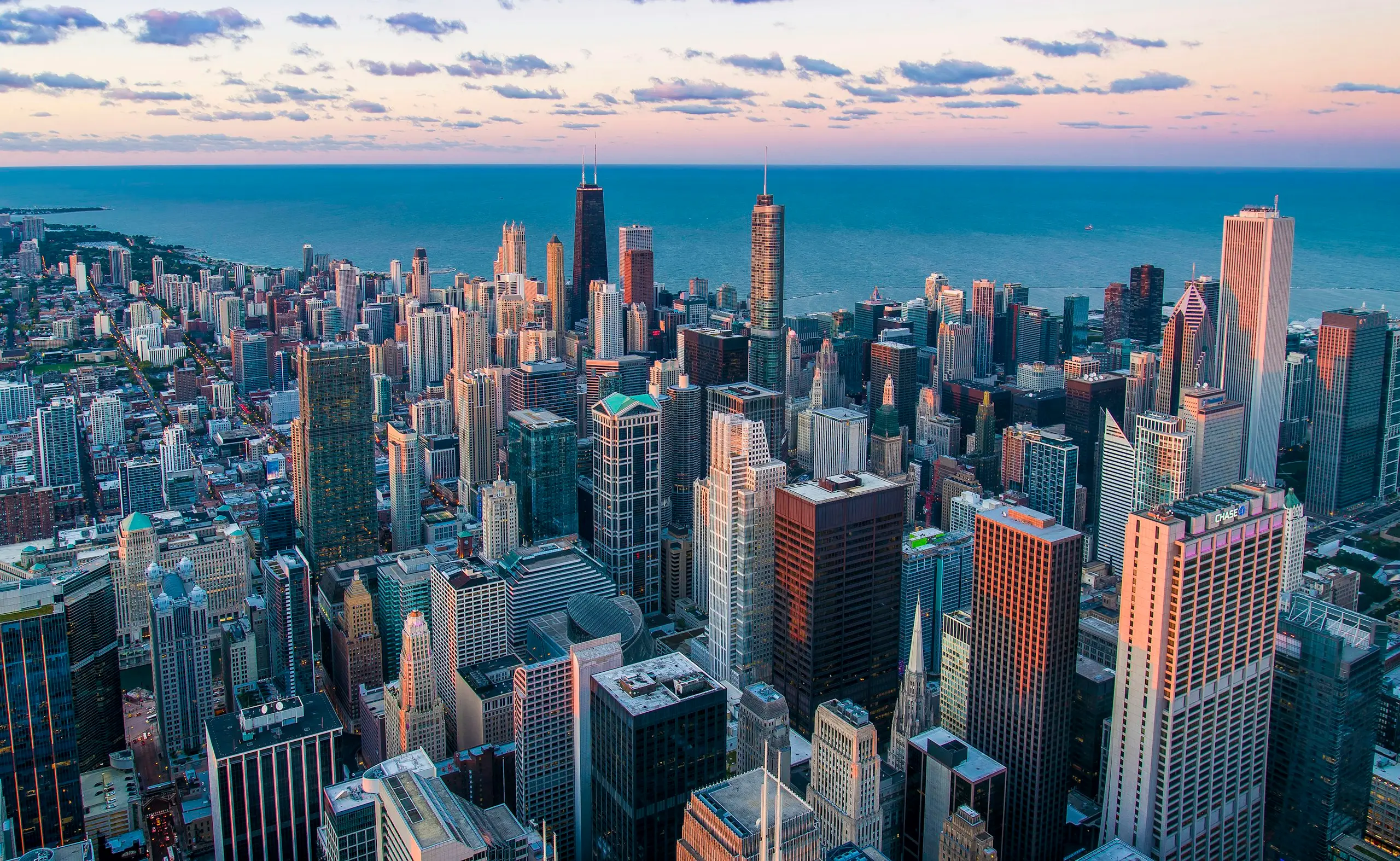 Aerial view of downtown skyscrapers beside Lake Michigan, Chicago